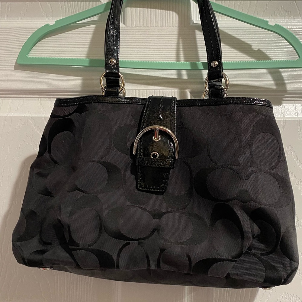 Beautiful black Coach handbag with feet!